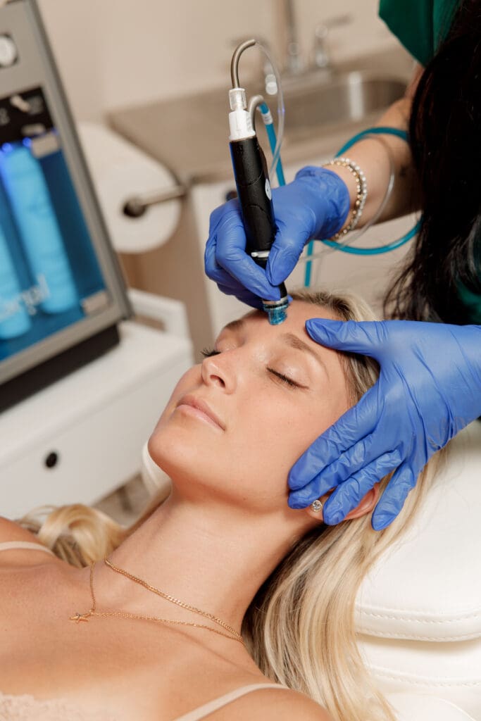 Aesthetician 5 Dr. Dozier's patient receiving a HydraFacial